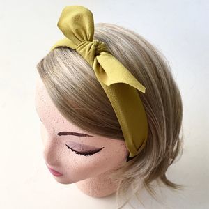Textured Green Fabric Covered Headband Sliding Bow